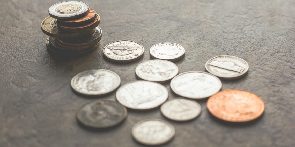coins on gray surface